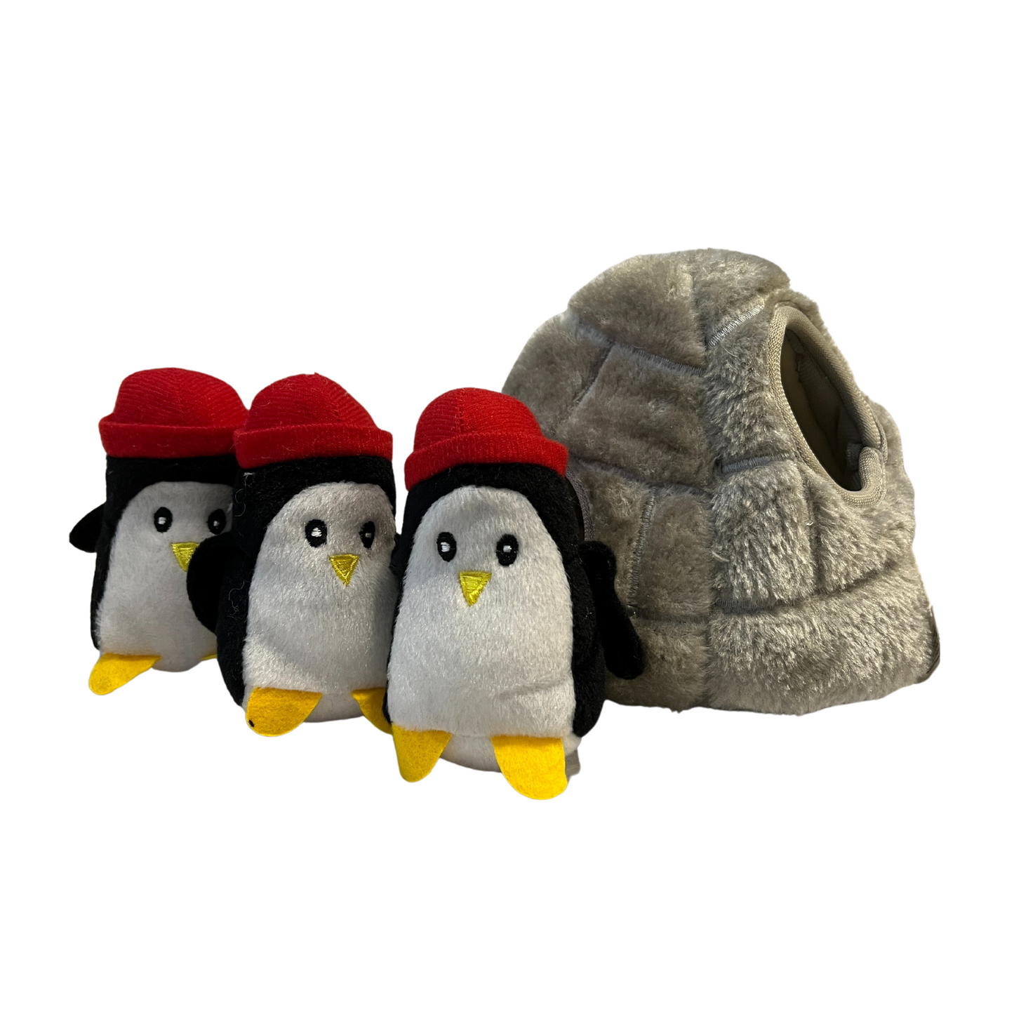 Zippy Paws- Igloo with Penguins Interactive Dog Toy. Three small plush penguins in red snow cap standing next to grey plush igloo.