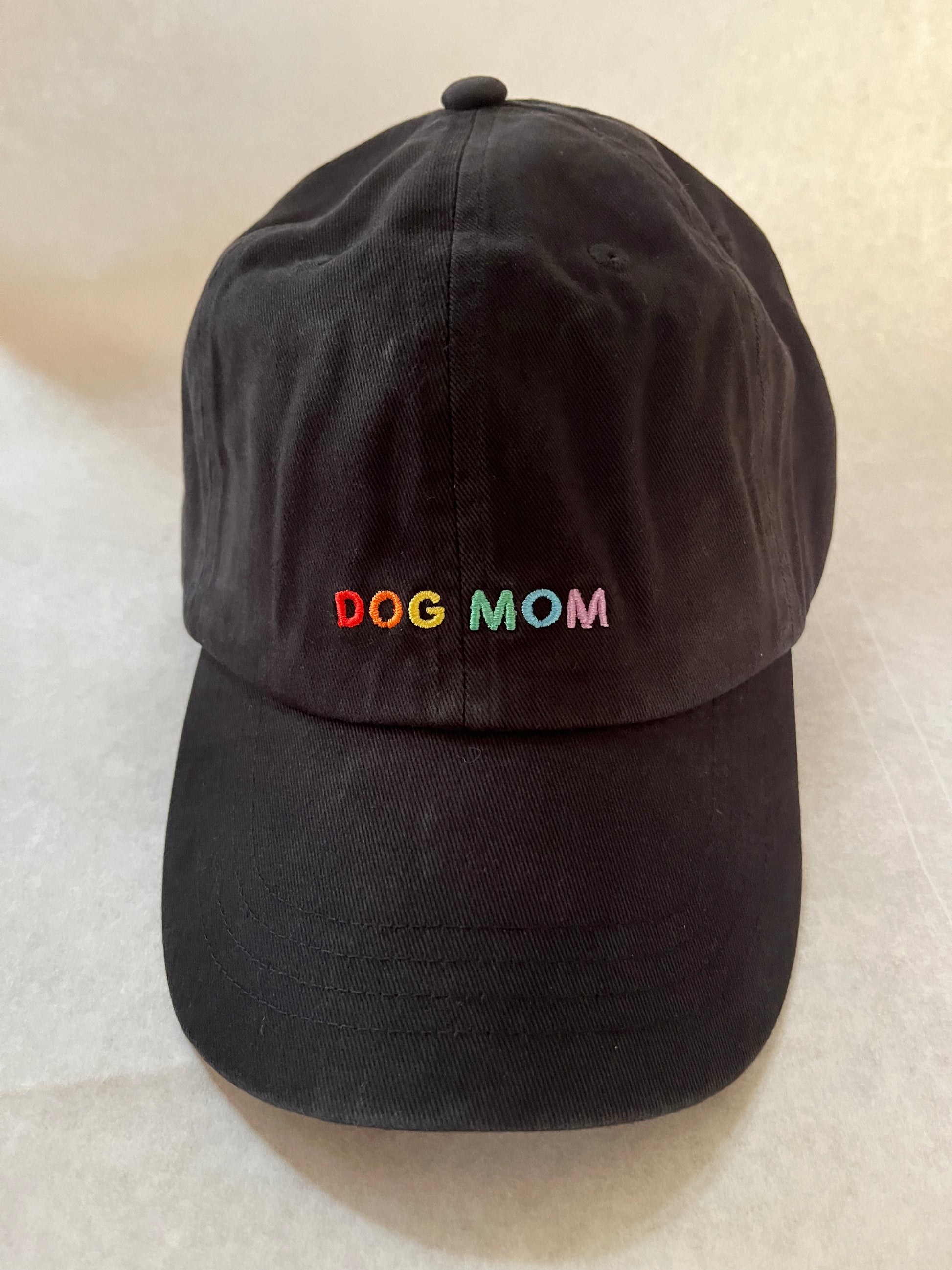 Black Dog Mom hat with rainbow letters