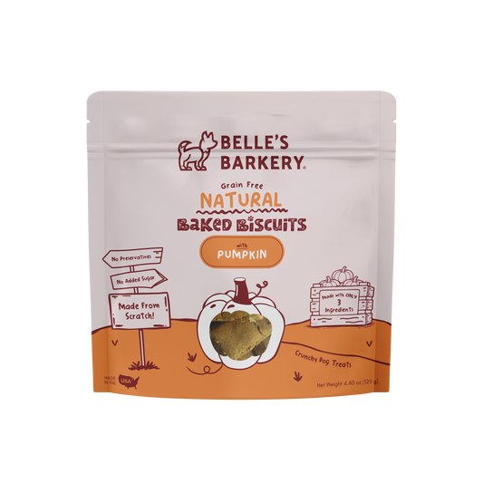 Package of Belle's Barkery natural baked biscuits on a white background