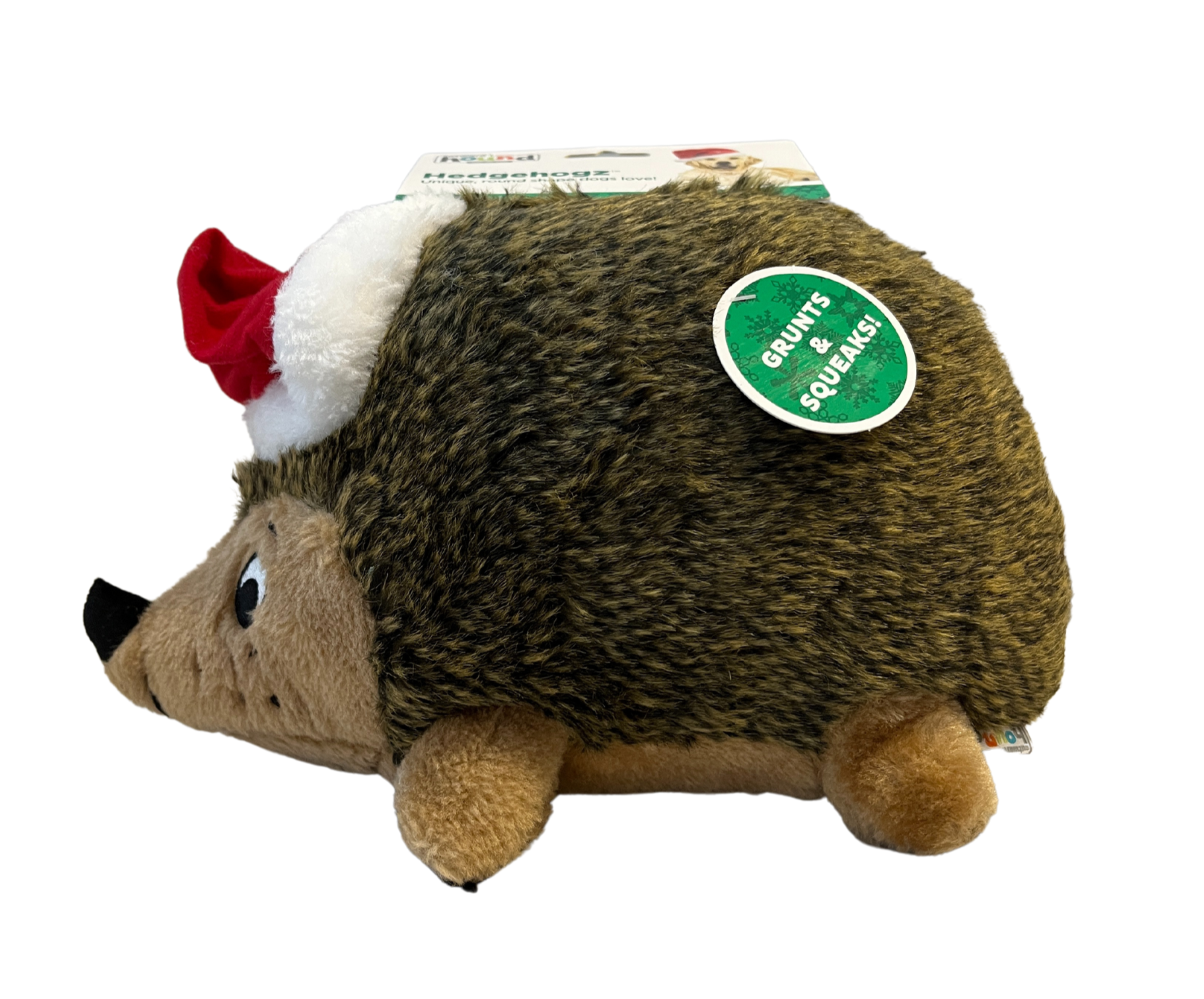 Side view of Outward Hound Holiday Hedgehogz- Large. Tag on toy reads, "Grunts & Squeaks!"