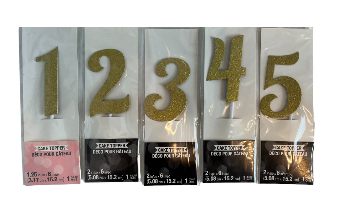 Gold number cake toppers in packaging. Numbers 1, 2, 3, 4, and 5 are shown.