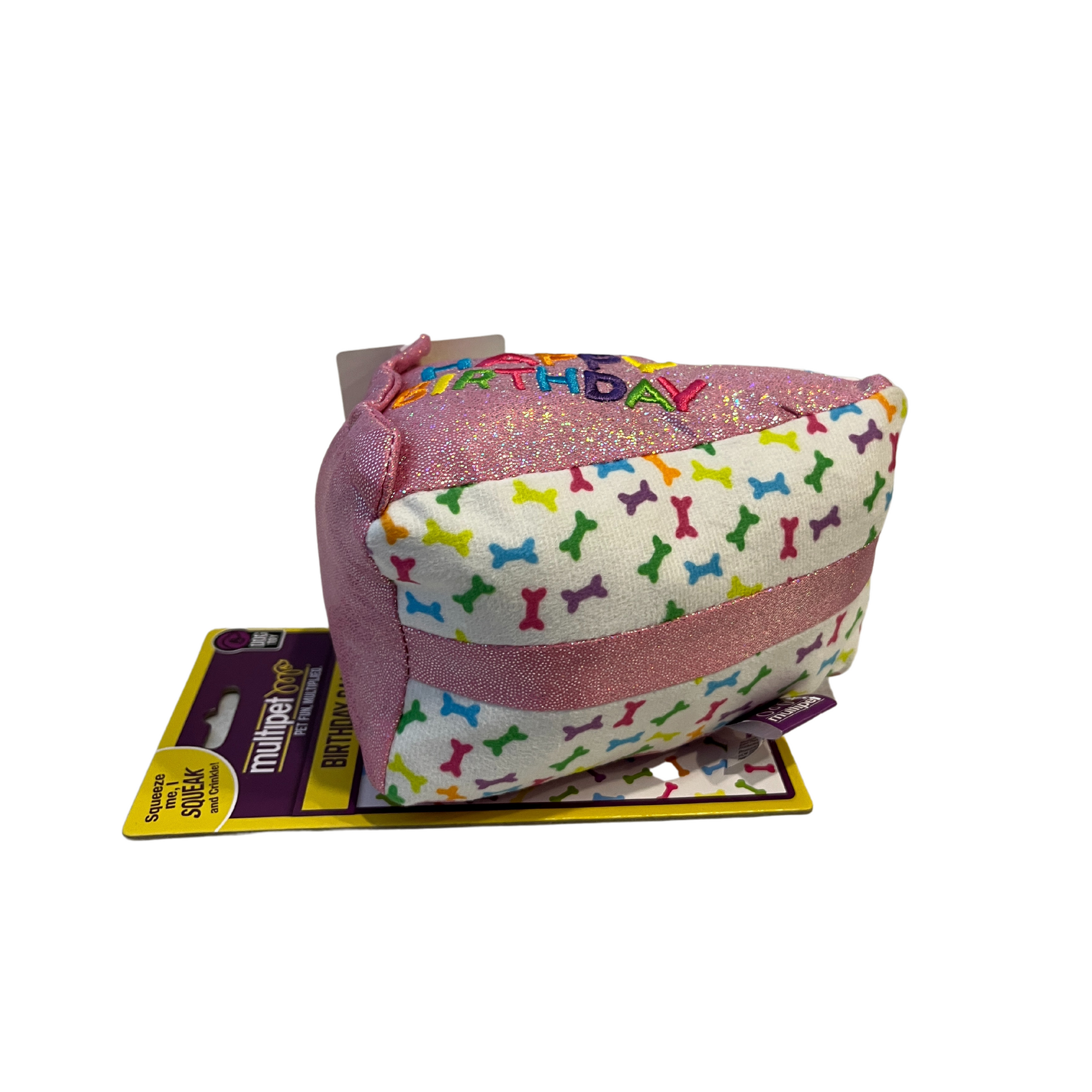 Side view of Multipet Pink Birthday Cake Slice Dog Toy